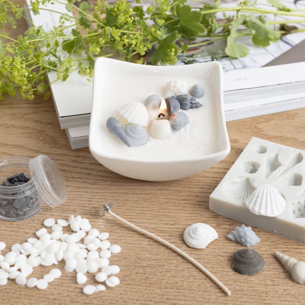 Kaarsenschaal met strandschelpen