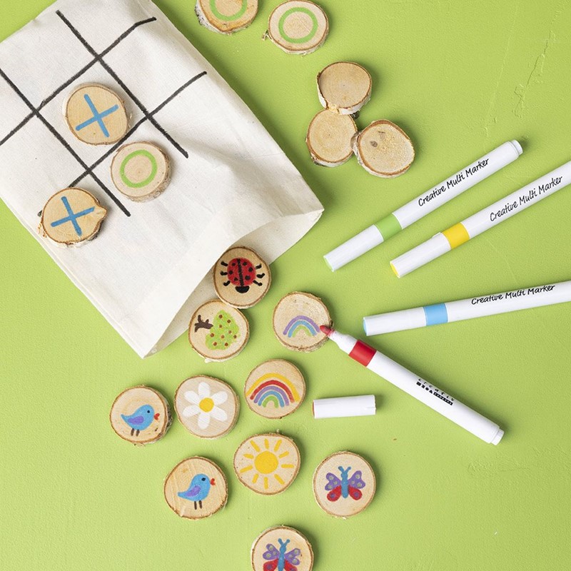 Zelf spellen maken van houten schijven met markers